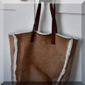 H04. Ugg handbag. 